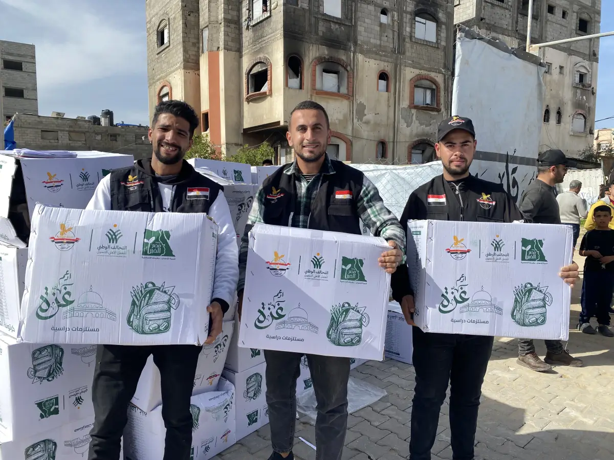 Egyptian committee distributes school bags and stationery to students in the sector