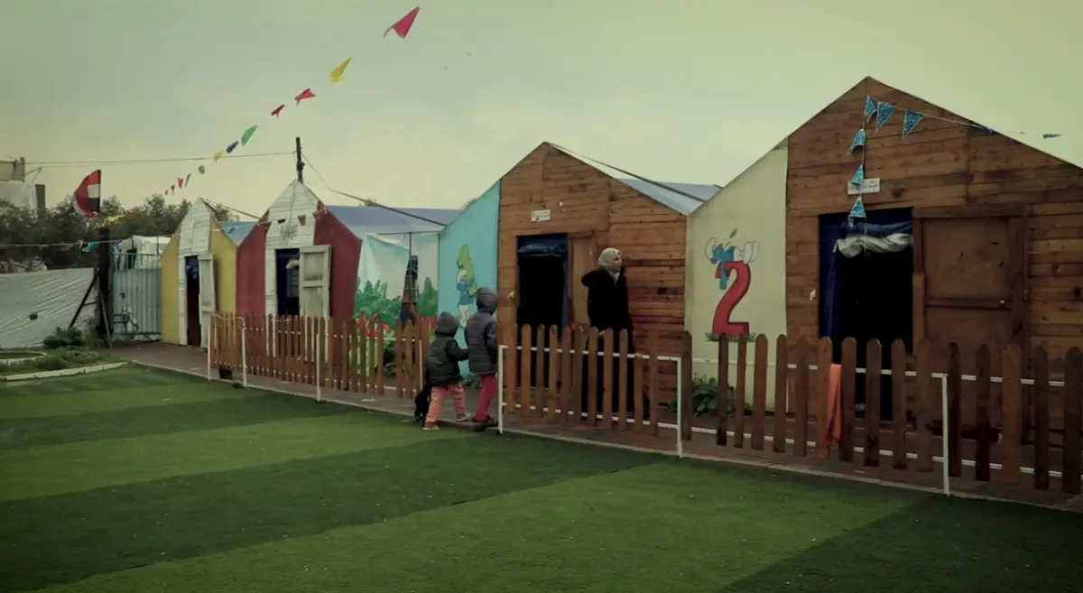 The Egyptian Committee distributes school bags and stationery to children in the orphan ca