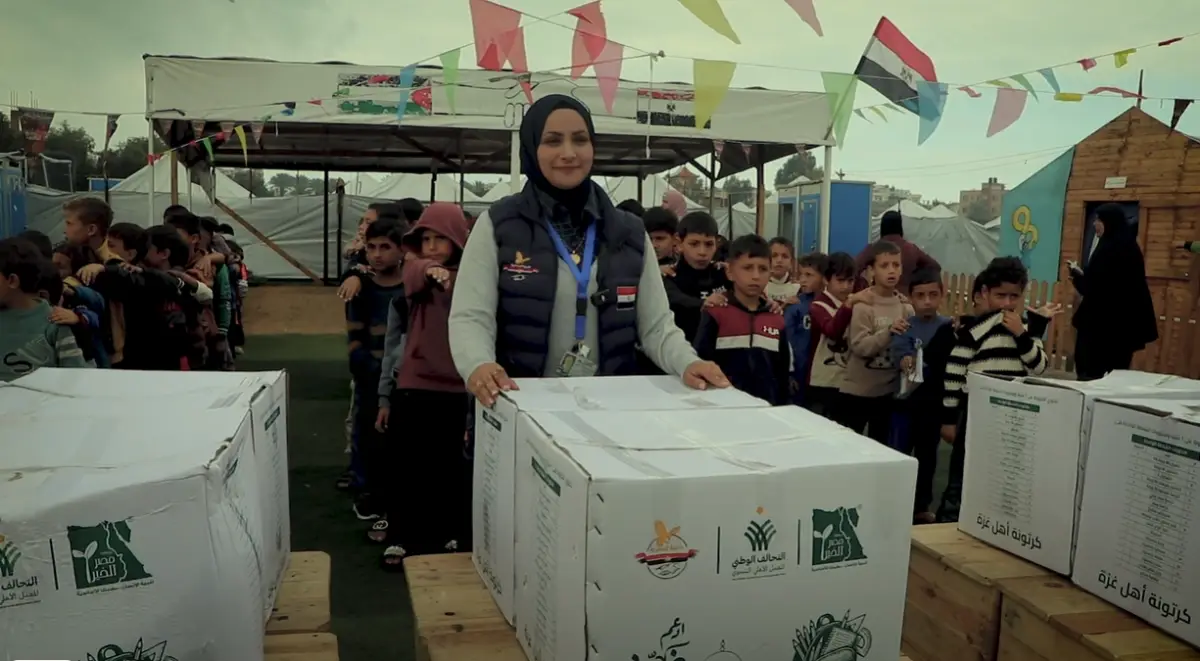 The Egyptian Committee distributes school bags and stationery to children in the orphan ca