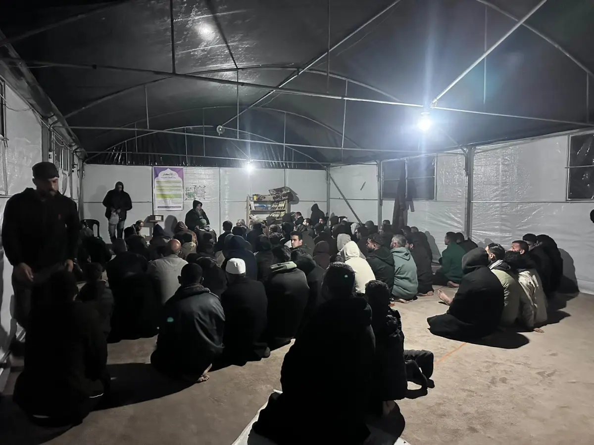 Distribution of Suhoor Meals to Those Observing I'tikaf in Mosques Across the Gaza Strip