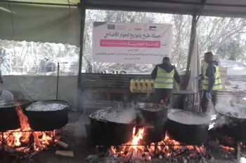 The Egyptian committee cooks and distributes sacrificial meat to those entitled to it in the sector