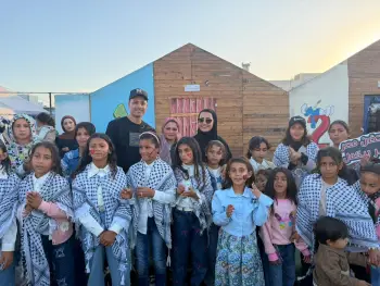 Organizing an awards ceremony at an Egyptian camp